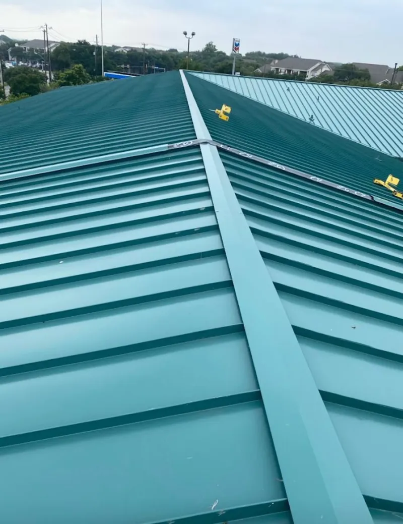 Green commercial metal roof ridge and valley for Metal Roof Repair in New Sewickley