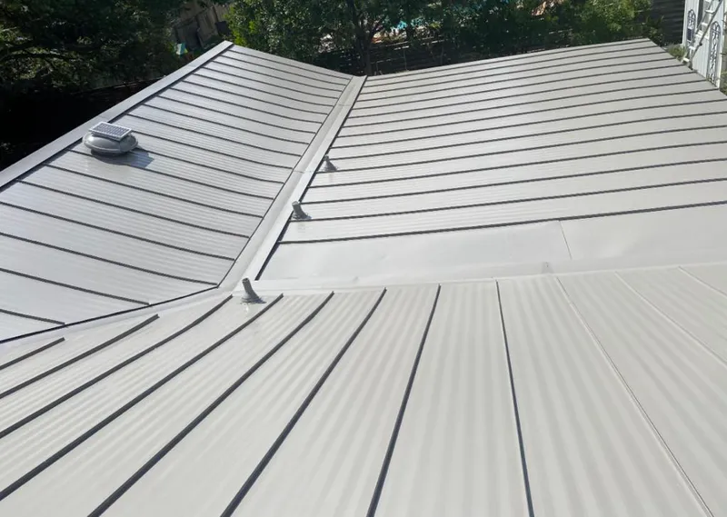 Solar attic fan installed on a metal roof for Roof Ventilation in New Sewickley